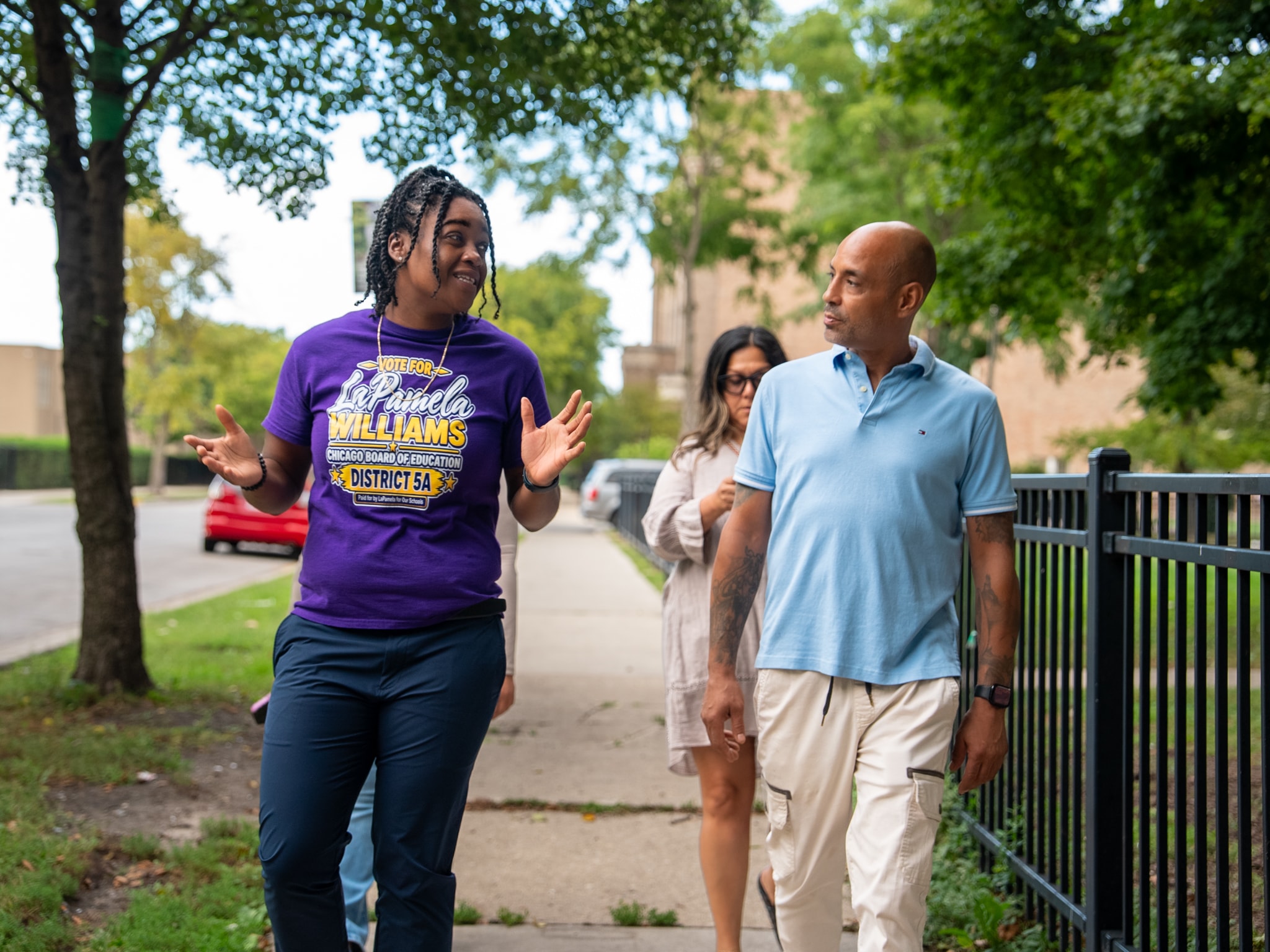 Walking the neighborhood with supporters